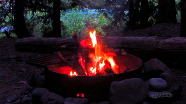 Watch Relax by a Campfire Beside a River Deep in the Mountains Online