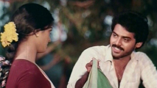 Watch Swarnakamalam Online