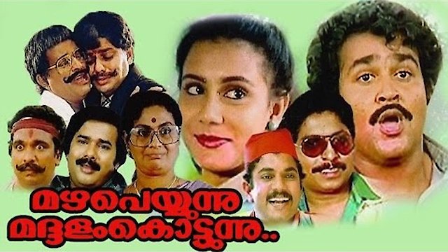 Watch Mazha Peyyunnu Maddalam Kottunnu Online
