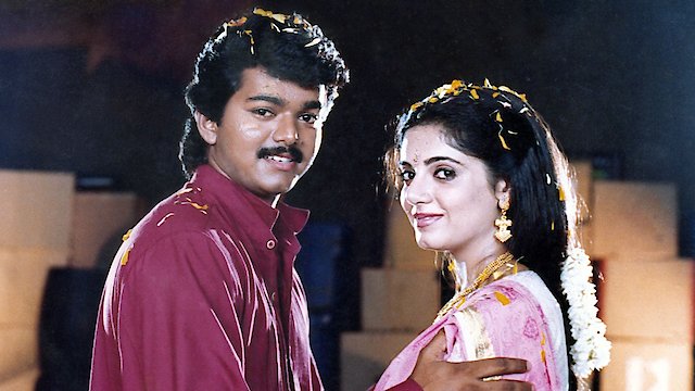 Watch Kaalamellam Kaathiruppen Online