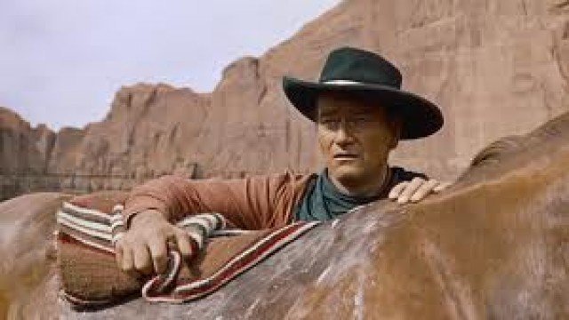 Watch John Wayne - In The Movies Online